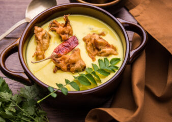 Punjabi Kadhi with vegetable pakora dumplings